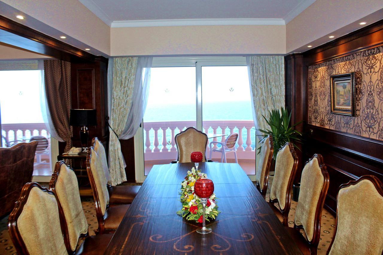 Tolip Hotel Alexandria Exterior photo The dining room of a suite